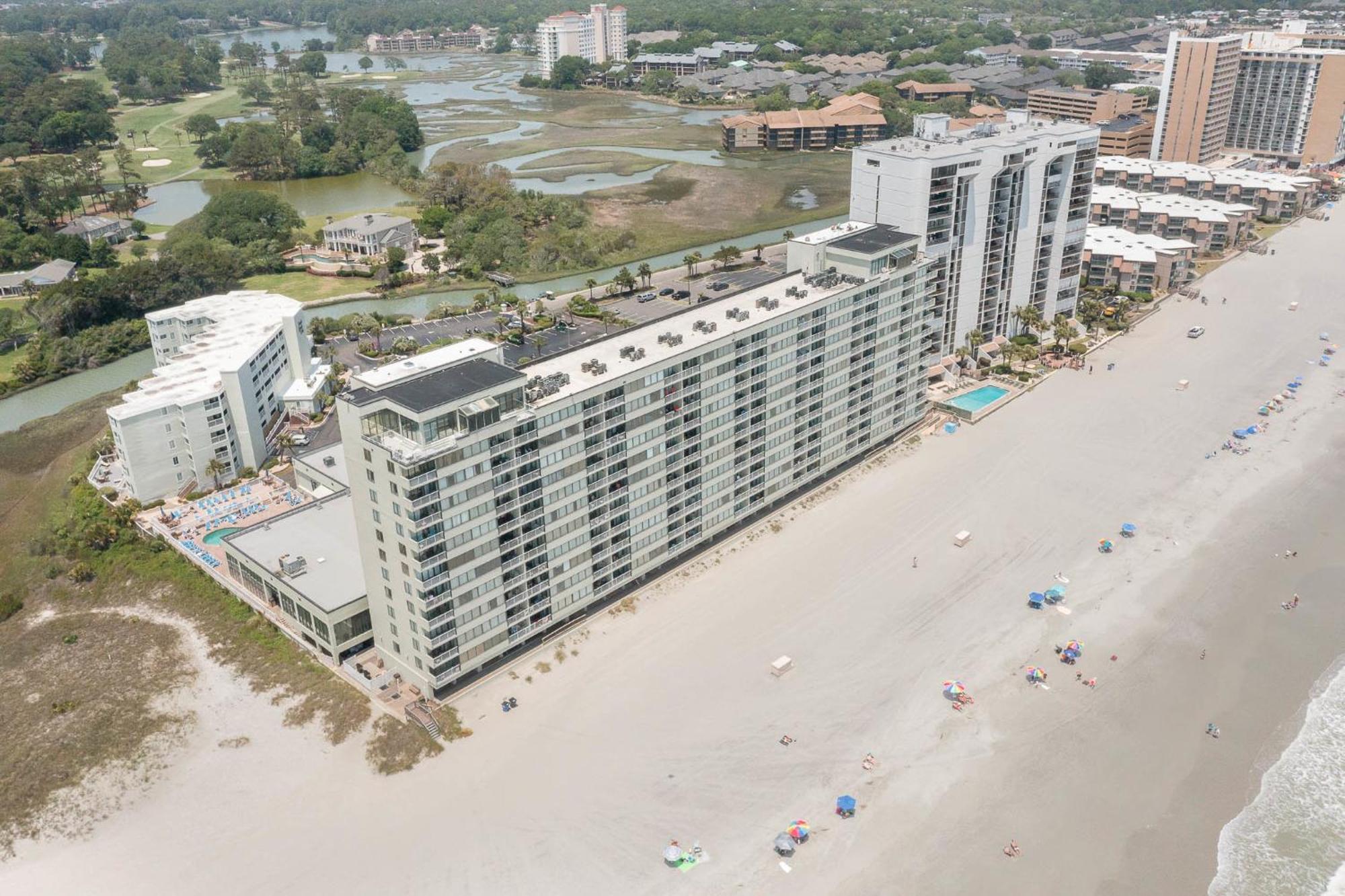 Sands Beach Club Briarcliffe Acres Esterno foto